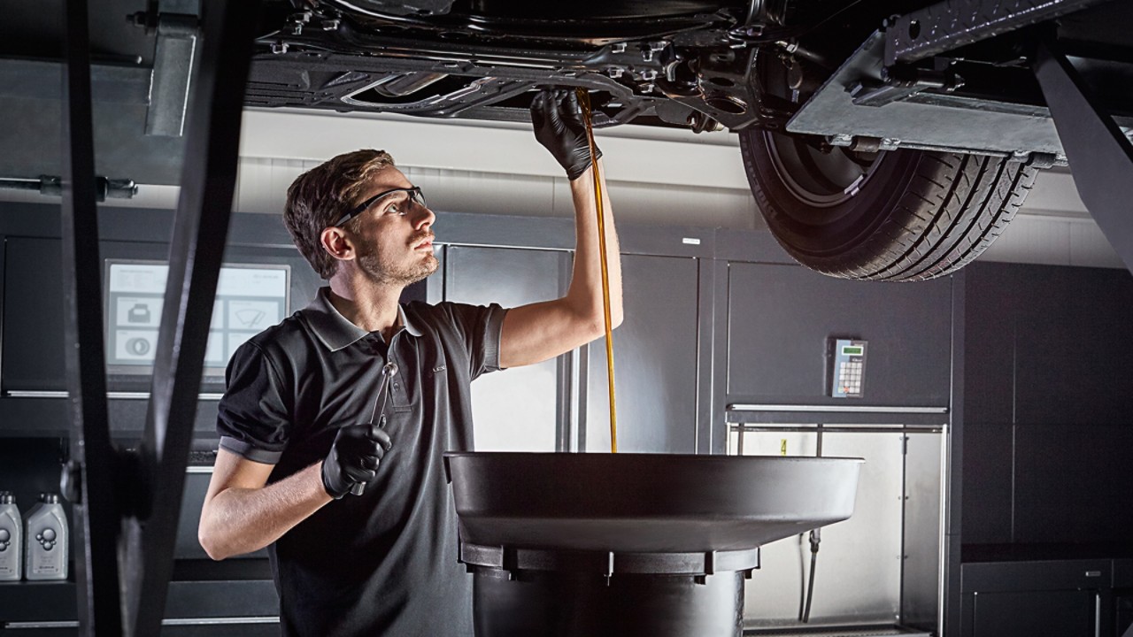 A Lexus mechanic working on a Lexus