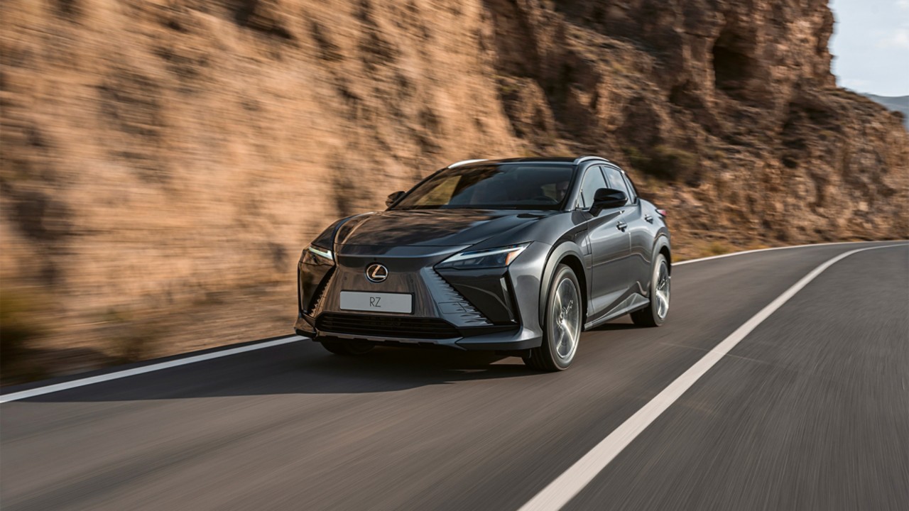 A Lexus RZ driving on a road