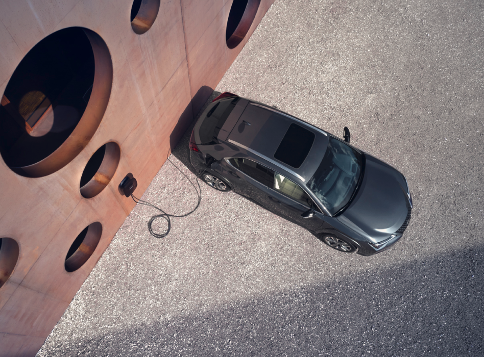 Aerial view of a Lexus UX 300e charging